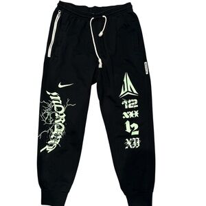 Nike Men’s Black and Neon Graphic Joggers